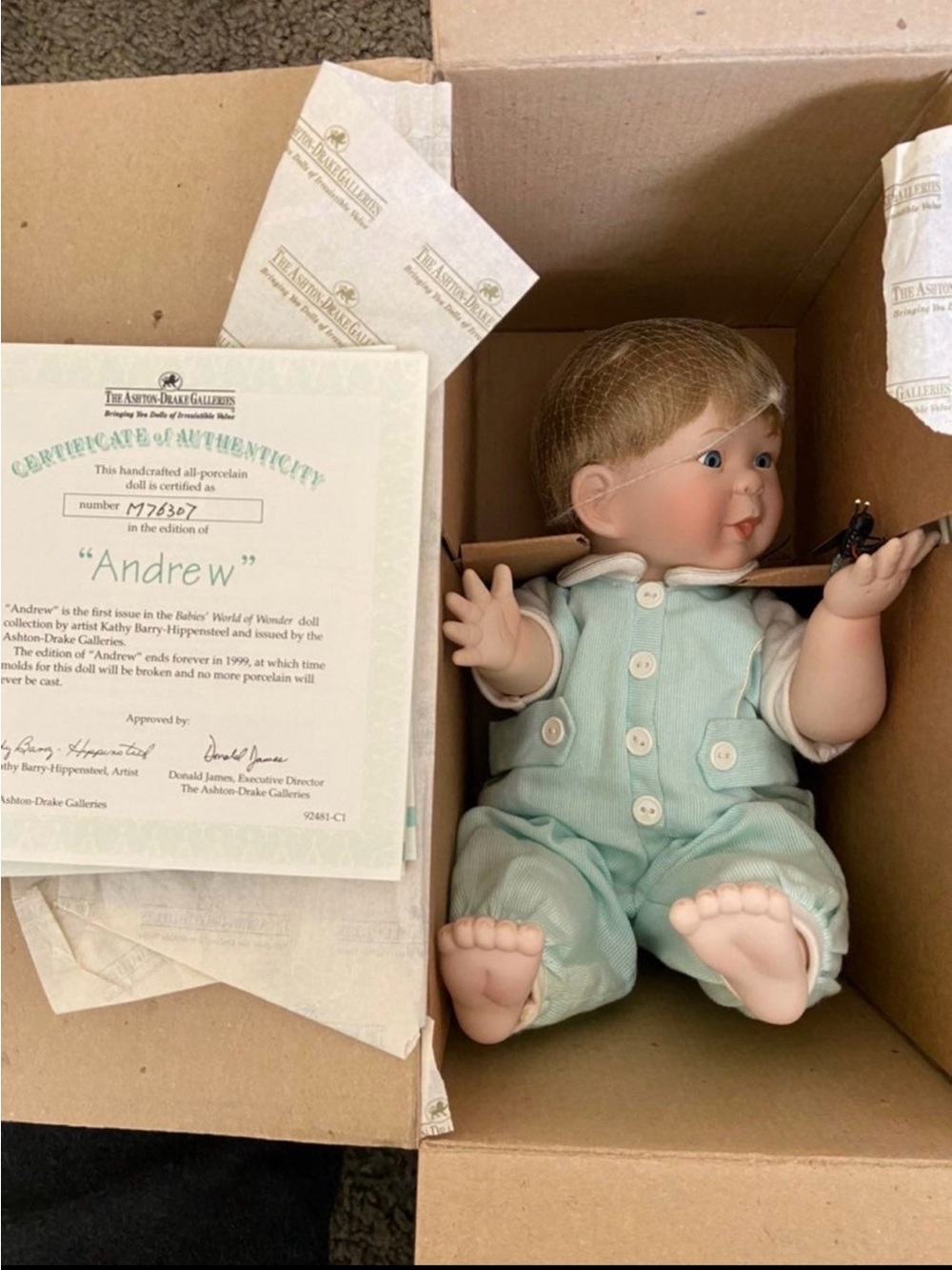 Porcelain Baby Doll 'Andrew' in Mint Green Romper